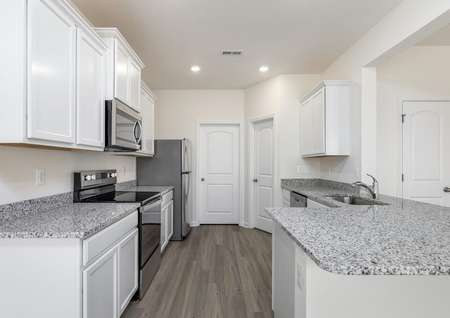 Chef-ready kitchen with stainless steel appliances.
