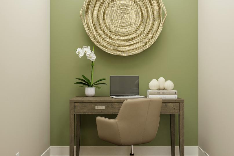 Rendering of study nook showing a full
  size wood desk, office chair, and dÃ©cor along a green accent wall.