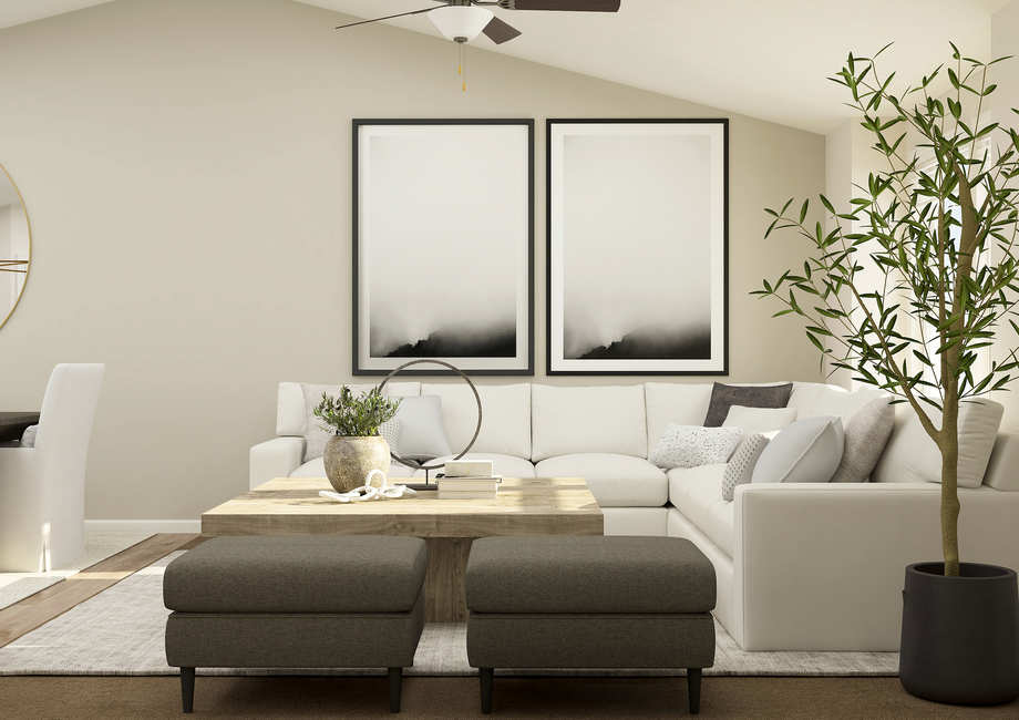 Rendering of a
  living room furnished with aÂ  white
  sectional couch and a wooden coffee table.