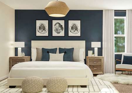 Rendering of a spacious secondary bedroom
  which has a large bed, two nightstands and an accent chair against a
  navy-painted wall with a window.