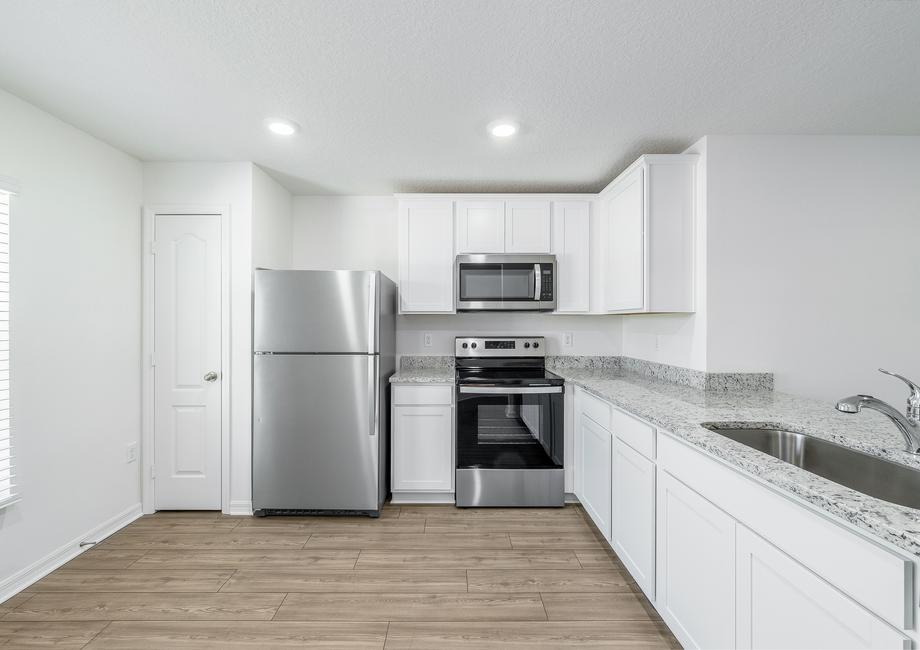 A spacious kitchen perfect for cooking family meals.