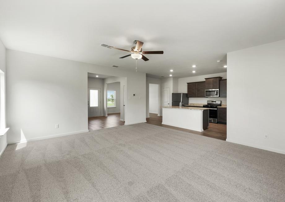 The family room is spacious and has plenty of space for furniture.