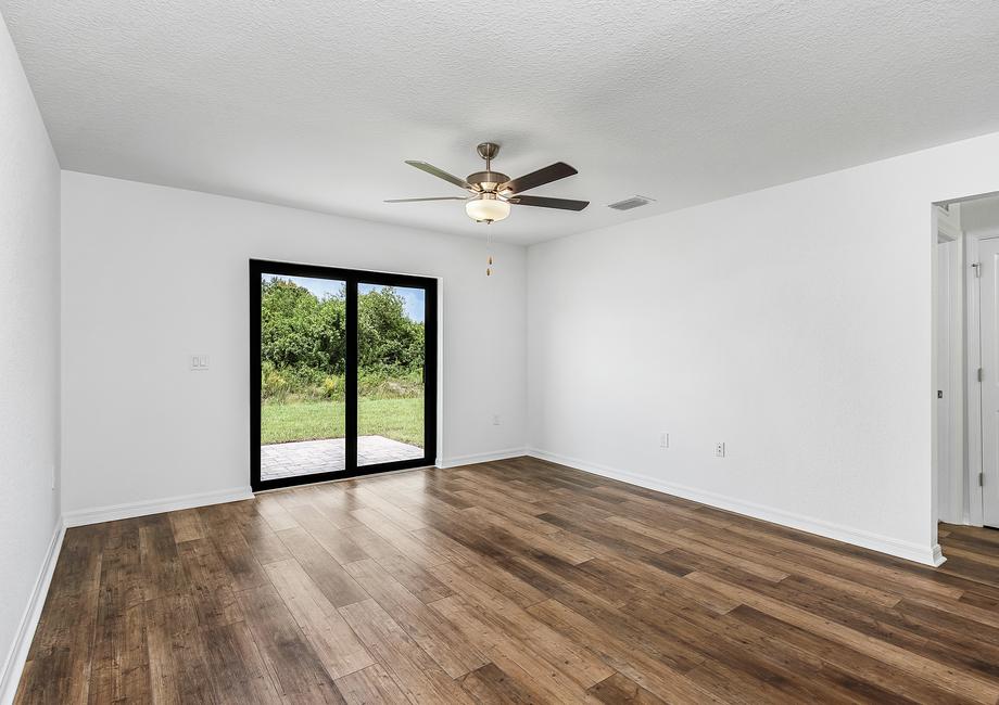 Sliding doors in the family room lead to the backyard.