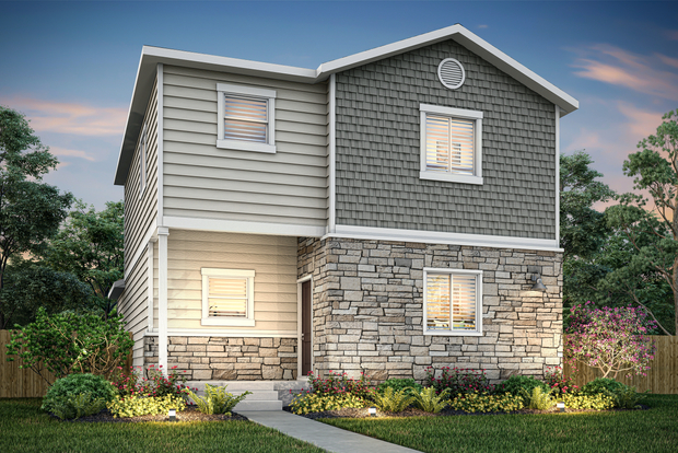 The Azalea is a beautiful two story home with siding.