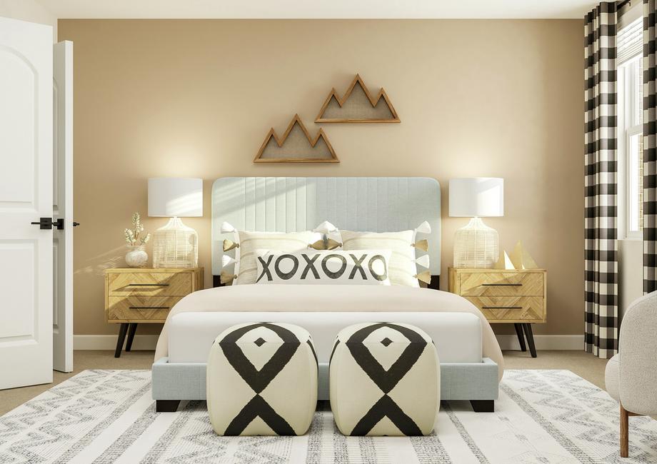 Rendering of a spacious bedroom in the
  Sequoia floor plan. The room has a large bed, two nightstands and an
  armchair. 
