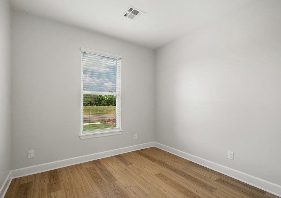 The secondary bedrooms are a great space for a child's bedroom or a guest room.