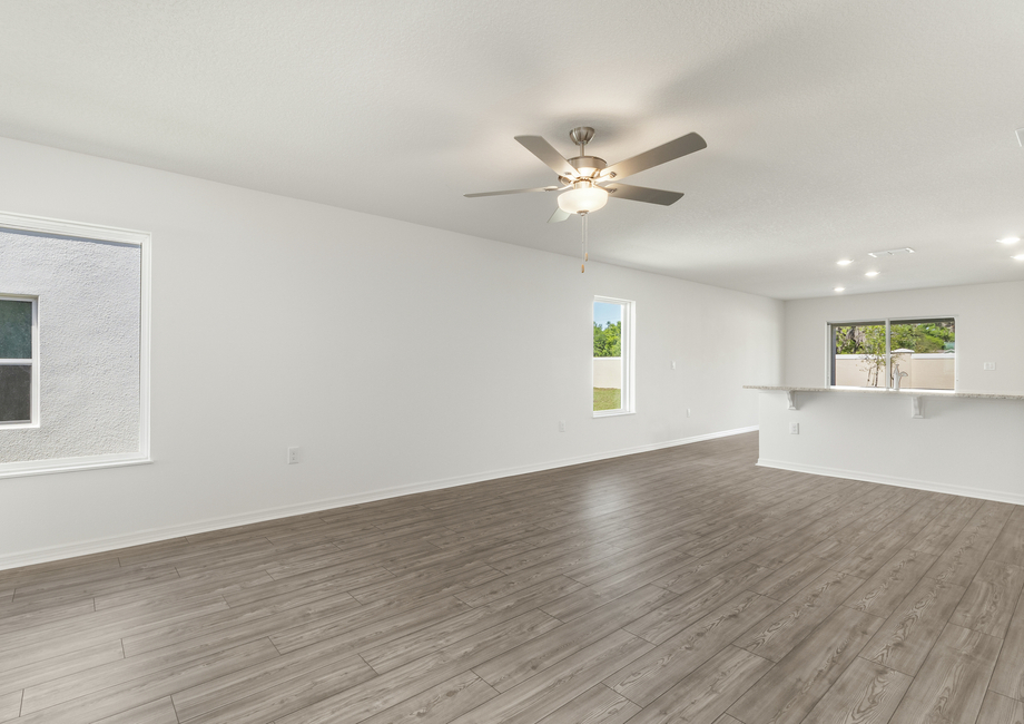 Two windows provide natural light in the family room