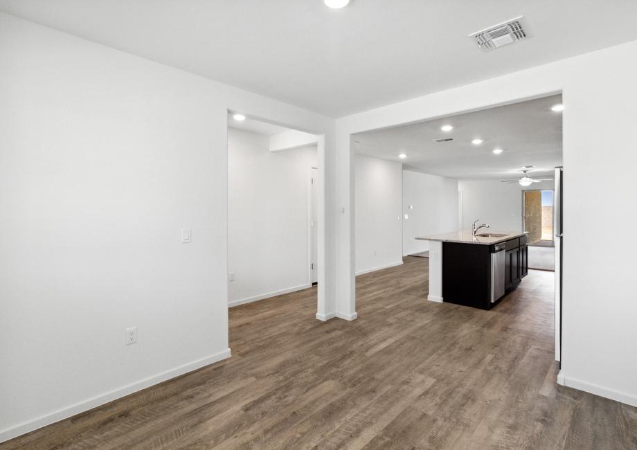 Formal dining room located off of the entry with access to the kitchen.