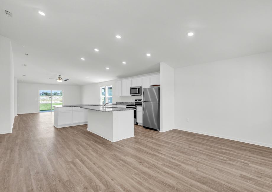 This open concept floor plan allows for plenty of bright light to shine through