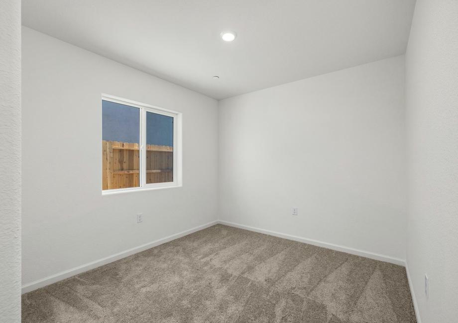 The secondary bedroom has carpet.