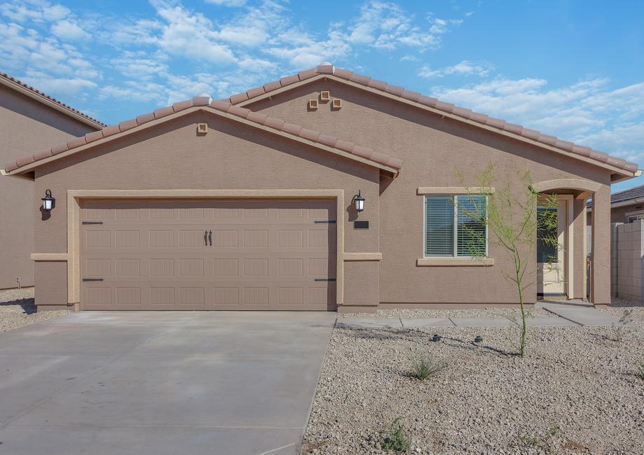 This home has a 2-car garage and a gorgeous stucco exterior.