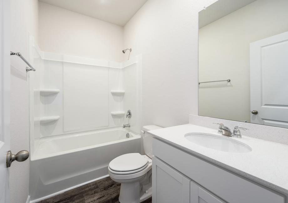 The secondary bathroom provides your guests all the space they need to get ready
