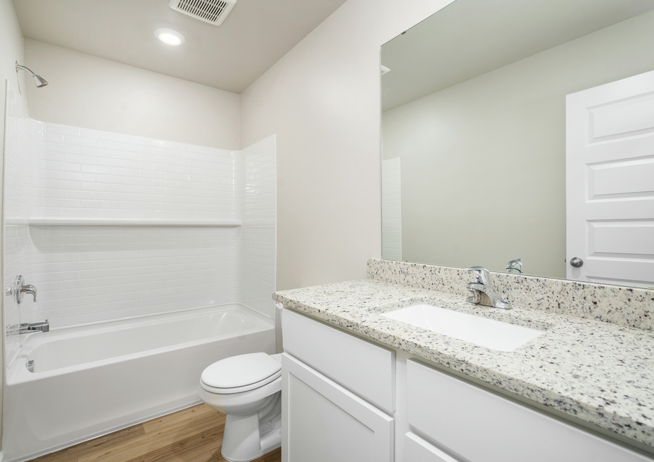 Secondary bathrooms are the perfect space for guests to get ready.