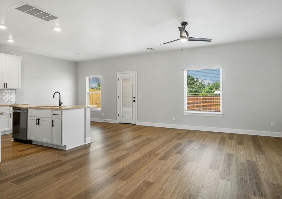 The large windows in the open living spaces let in great natural light and backyard views.