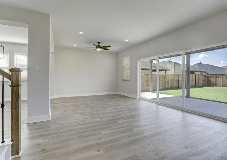 Open layout with the living room overlooking the back patio.