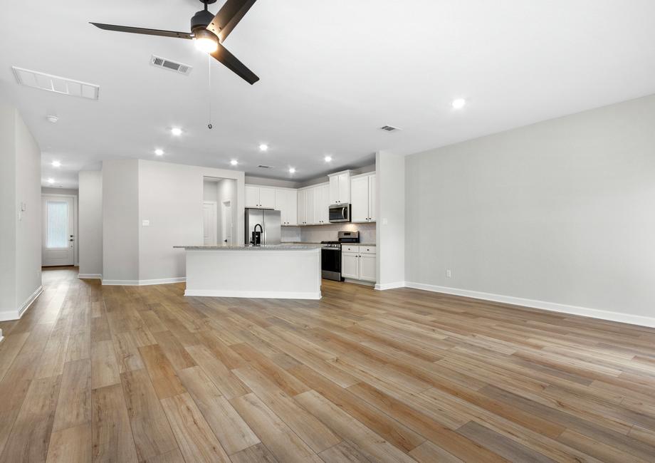 This open floorplan features a connected front room and kitchen!