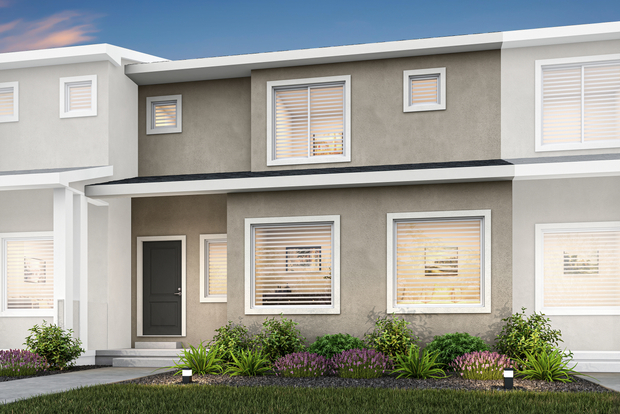Rendering of the two-story Coral townhome with a stucco exterior.