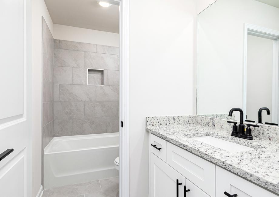 The secondary bathroom provides a great space for your family and guests to get ready