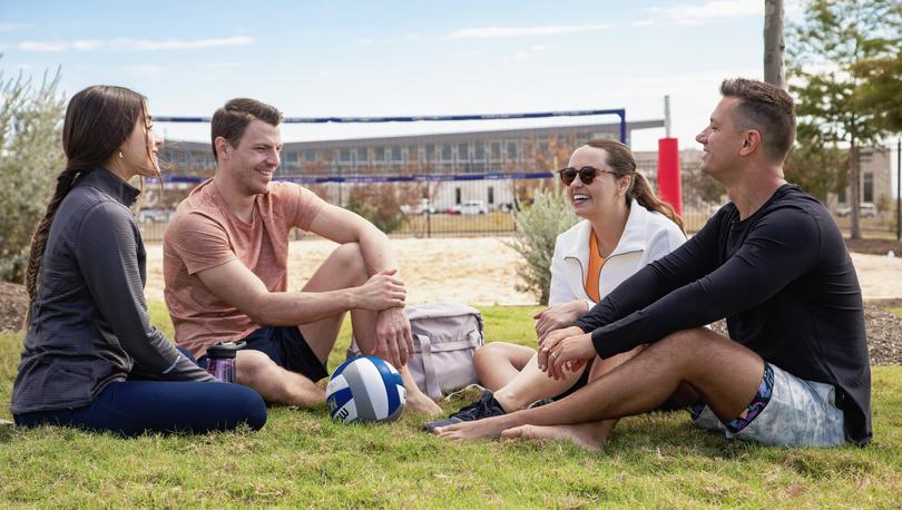 Group of friends spending time at the volley ball court.