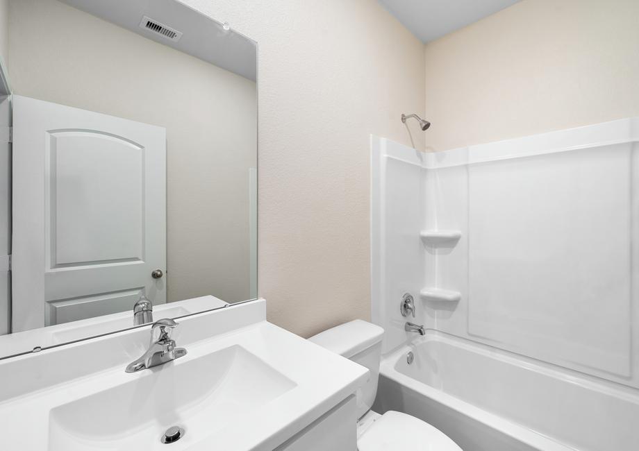 The secondary bathroom with a tub/shower combination
