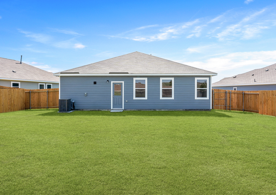 The back yard of the Reed is fully fenced-in.