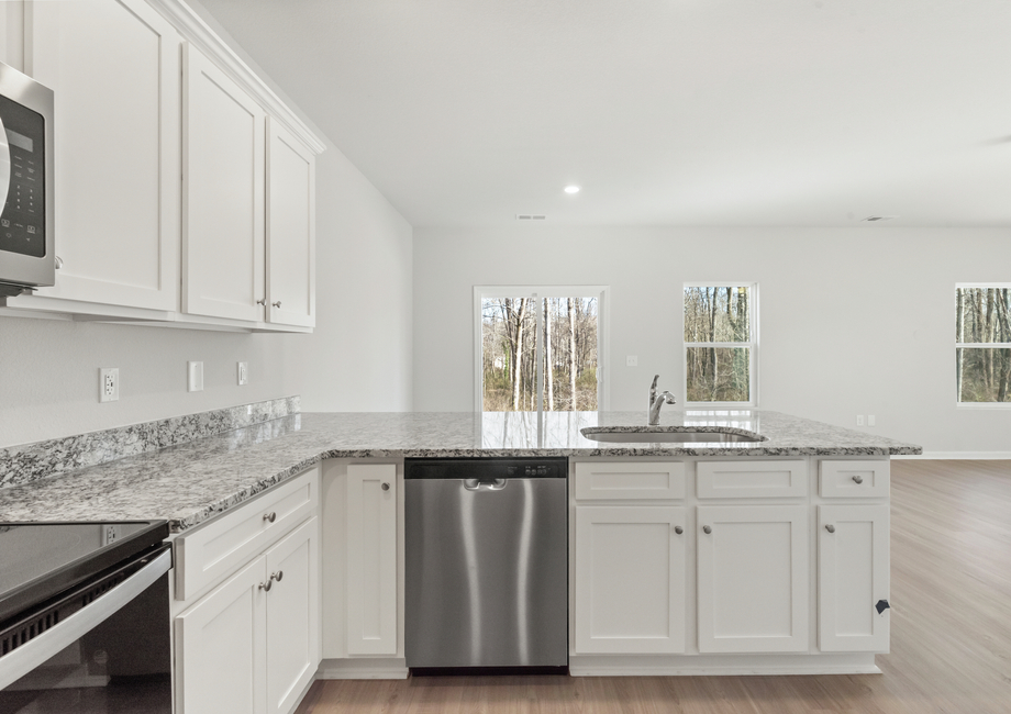 The kitchen overlooks the dining area