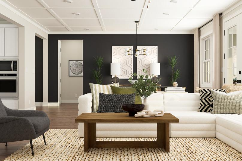 Rendering of a living room furnished with
  a larch white sectional and a side chair. This room is also furnished with a
  coffee table.