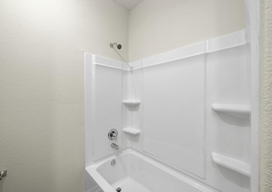 The secondary bathroom with a bathtub