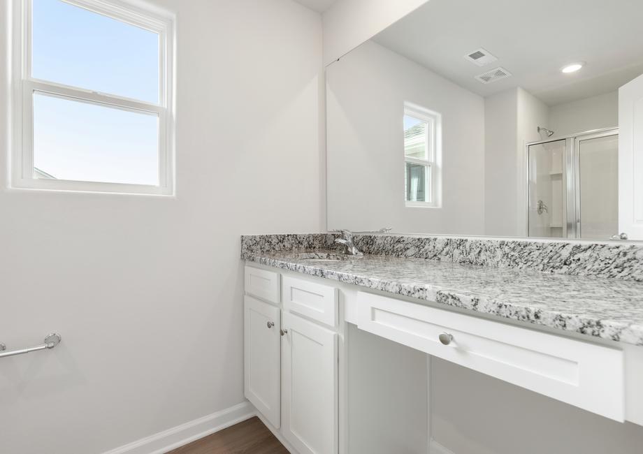 Master bath with a large vanity.