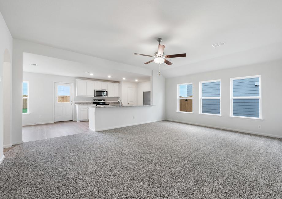 The family room of the Reed  is large, and has three windows that let in great, natural light.