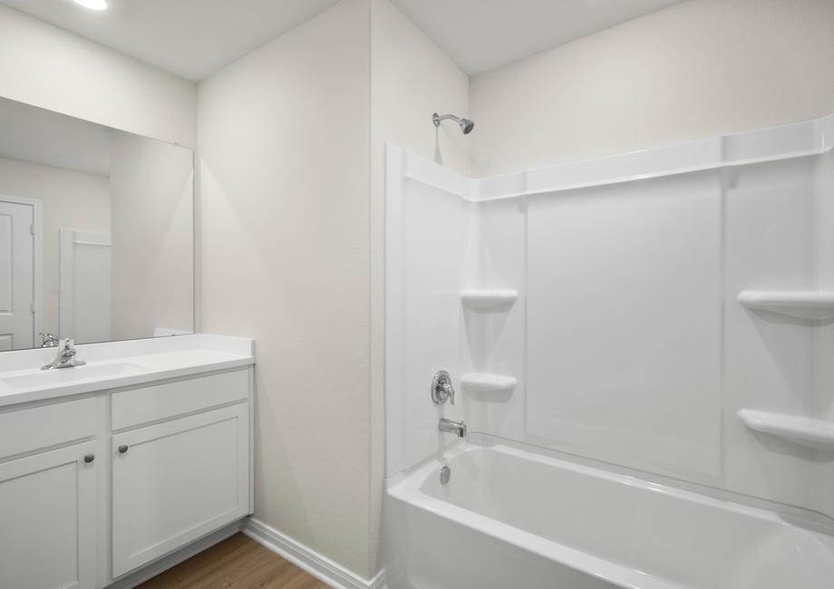 The secondary bathroom has a tub/shower combination.