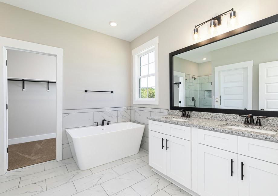 Master bathroom with a standalone tub.