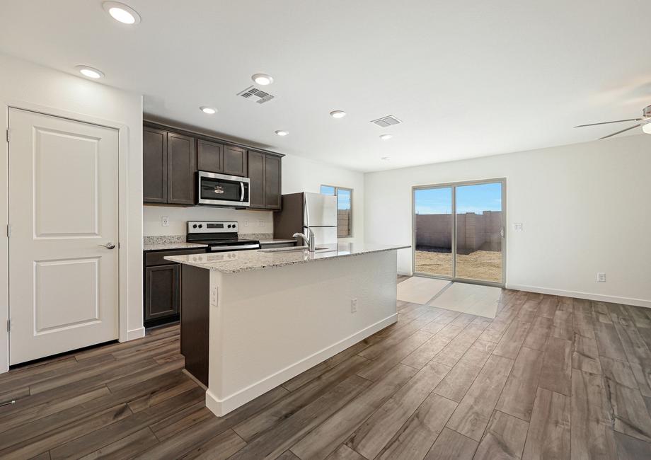 The spacious kitchen is perfect for preparing your family's favorite meals and treats.