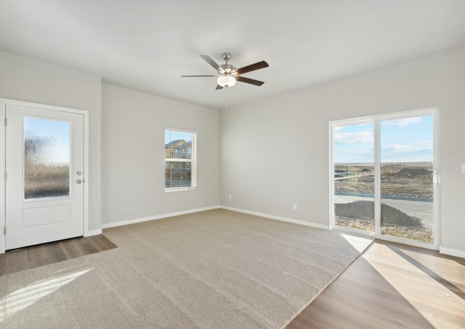 The family room is off the entrance and the dining room and kitchen.