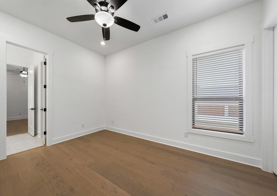 The secondary bedrooms in this home are the perfect space for children's bedrooms or guest rooms.