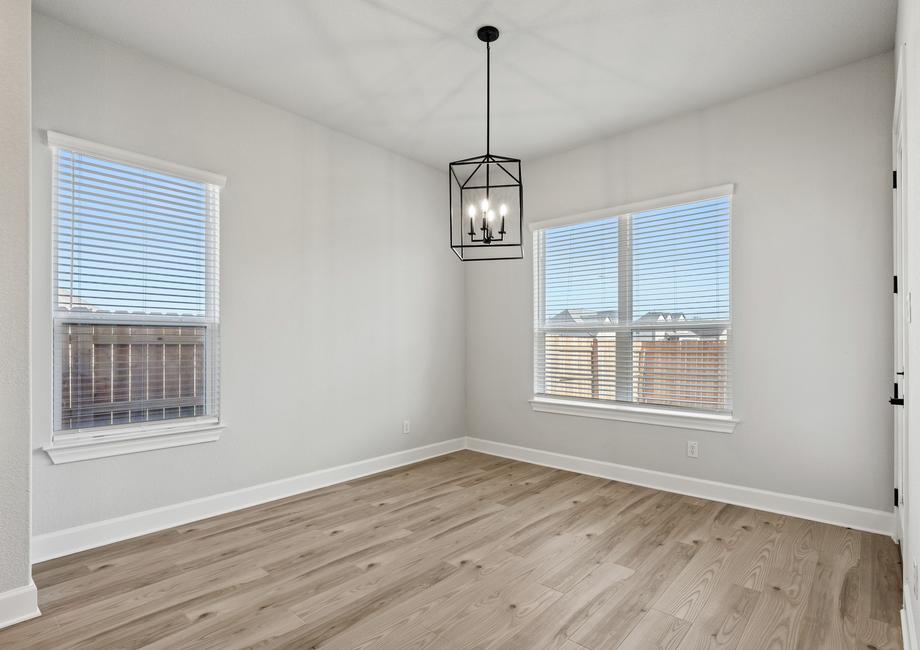 Off the kitchen is a cozy dining nook.