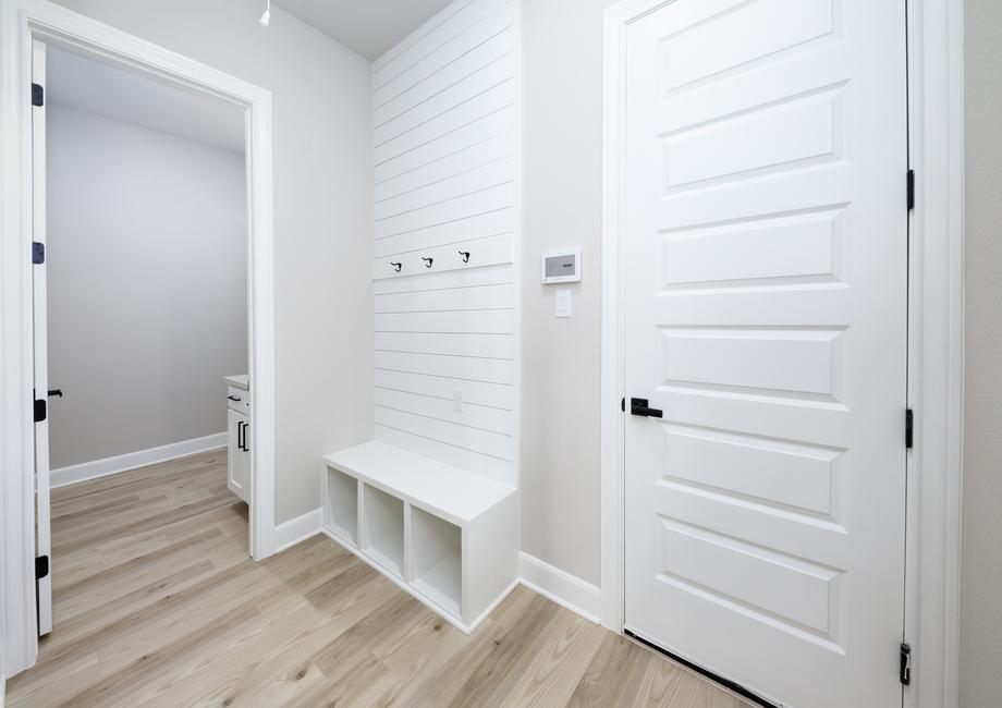 Mudroom with a built-in storage bench.
