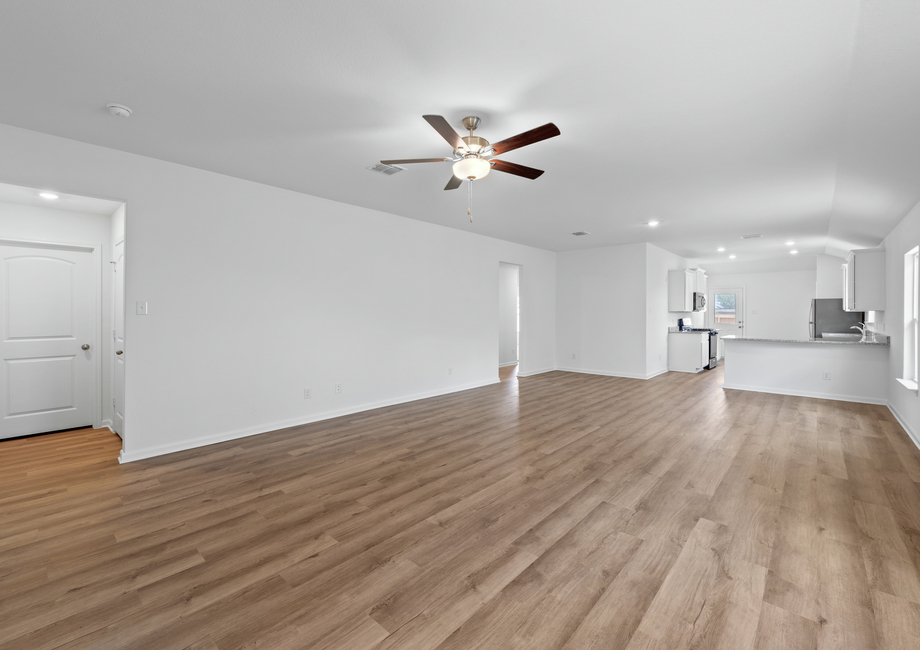 Open-concept family room and adjoining kitchen