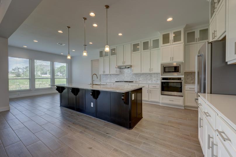 The designer kitchen sets the stage for hosting brunch with friends.