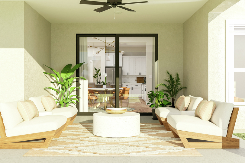 Rendering showcasing four large outdoor
  chairs in front of an expansive backyard. There is also a circular coffee
  table on a striped rug and three potted plants.