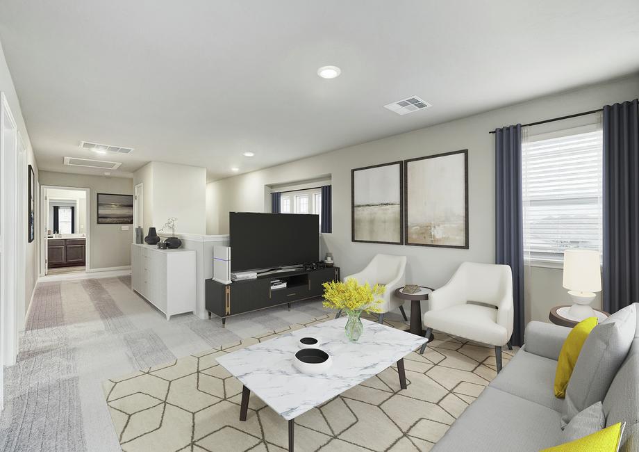 Staged game room with white chairs and a gray couch.