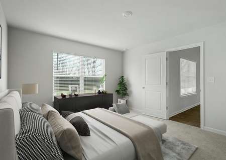 The Blanco master bedroom has room for a large bed and bed side tables.