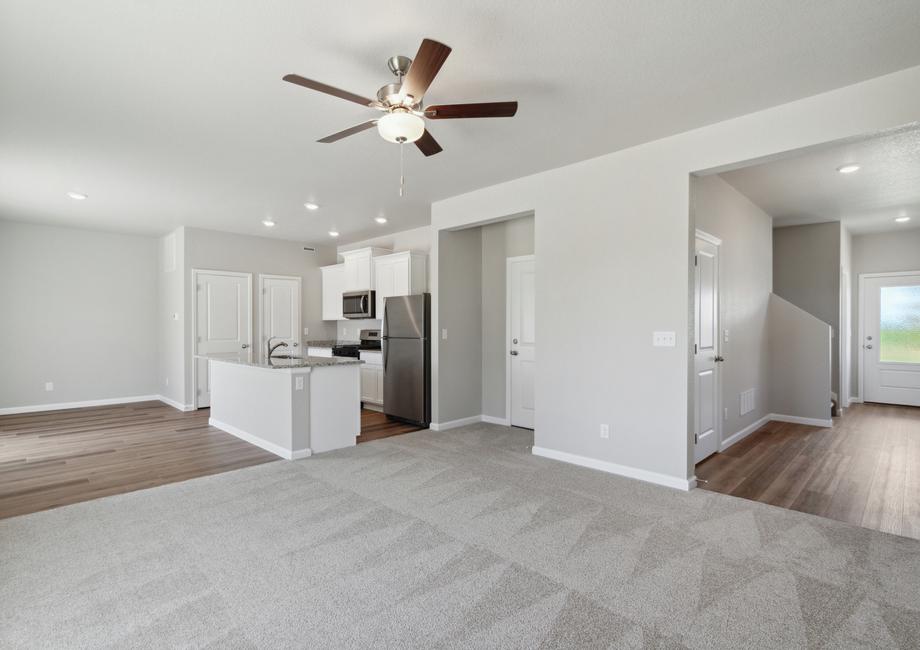 The family room sits right off of the kitchen and dining room creating an open-concept layout.