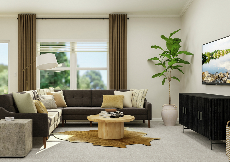 Rendering of the family room featuring a  sectional couch, round coffee table, media console and potted tree with a  large window in the background.