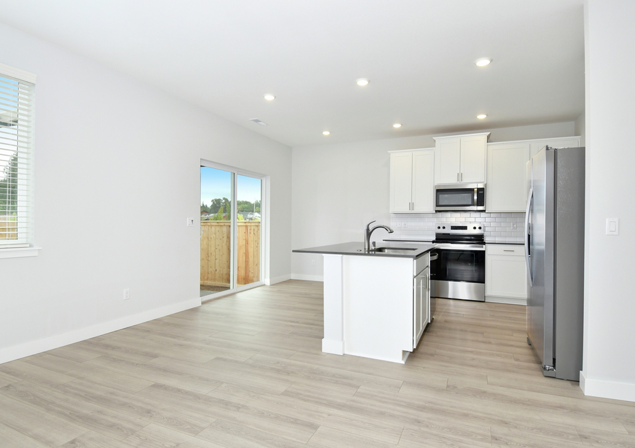 The kitchen is open to the dining room.