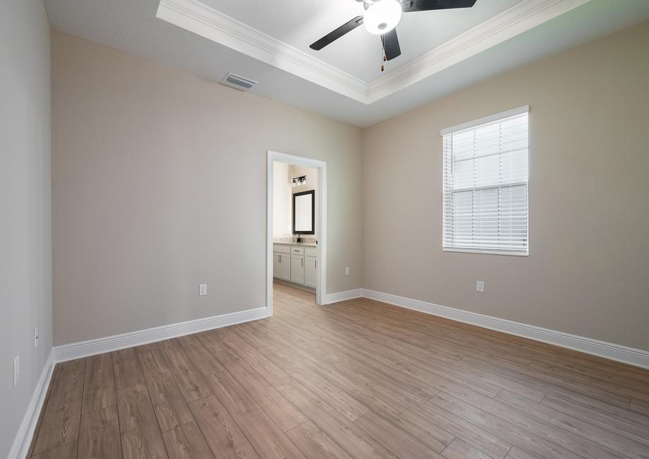 The master bedroom has its own bathroom and walk-in closet.