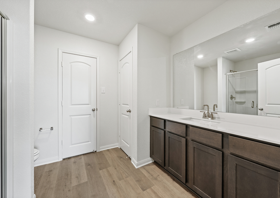 The master bathroom of the Rio Grande has a spacious vanity space.