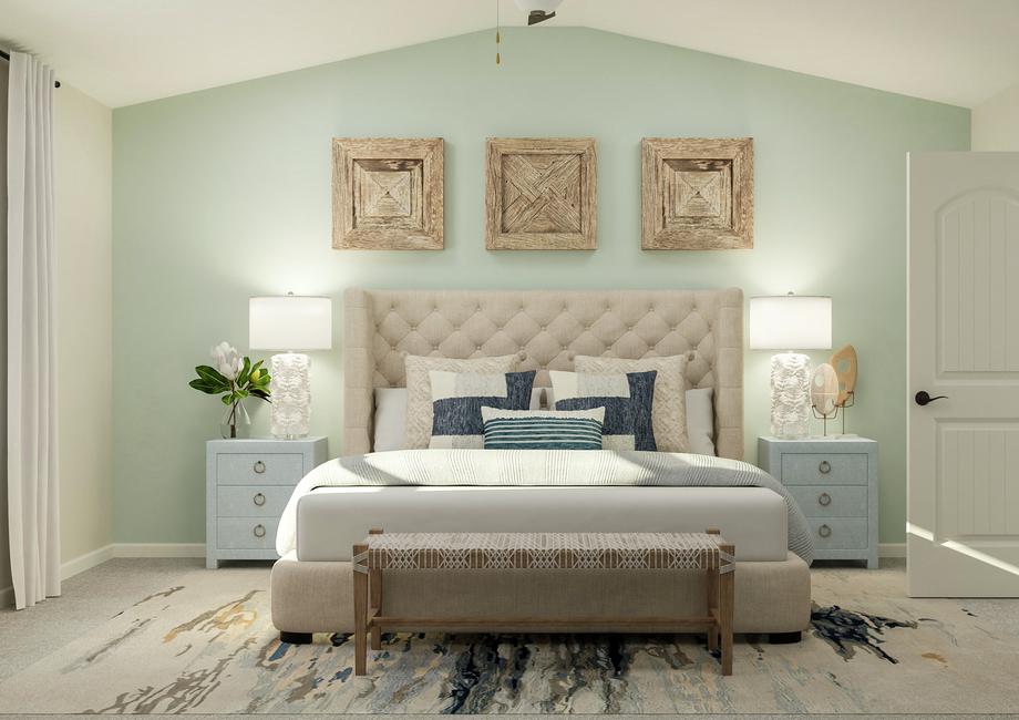 Rendering of the spacious master suite in
  the Avery floor plan. The room has a vaulted ceiling and carpeted flooring
  and has been furnished with a bed, nightstands and a bench.