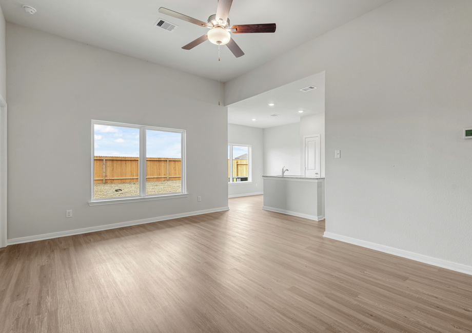 Enjoy views of the backyard from the living room and dining room