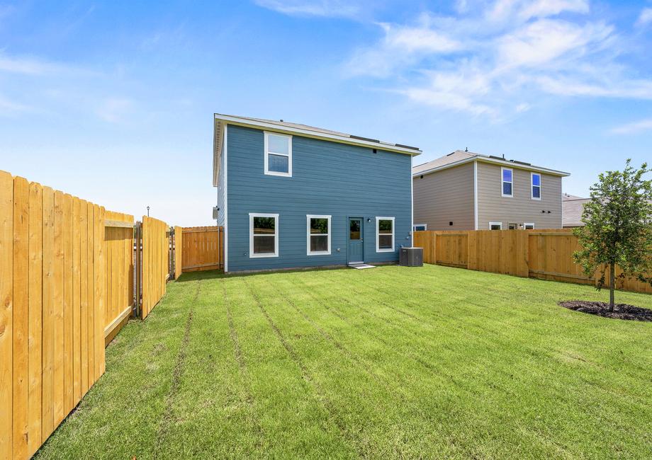 The back yard of the Rayburn is fully fenced-in.